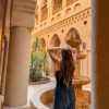 Tiffany in an ornate courtyard
