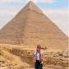 Felicia standing in front of a pyramid at Giza