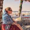 Allison sitting on the deck of a boat on the Nile
