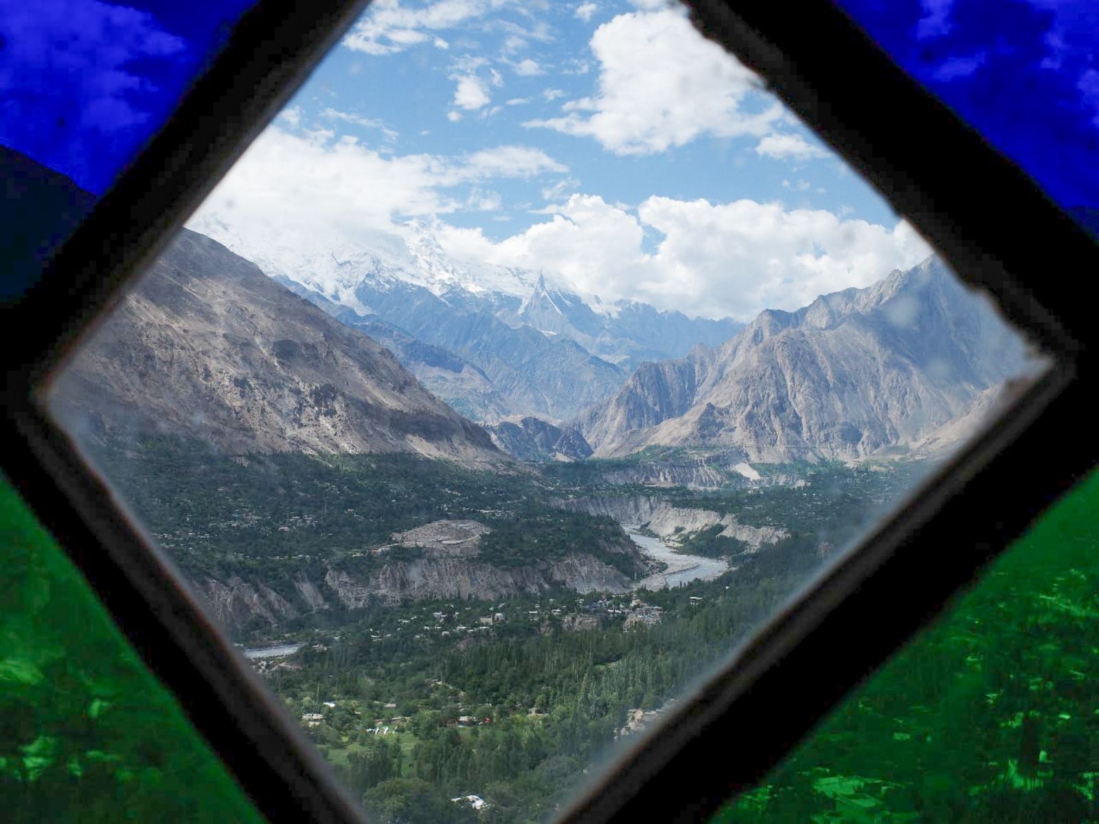 Mountain valley in northern Pakistan seen through a diamond-shaped window
