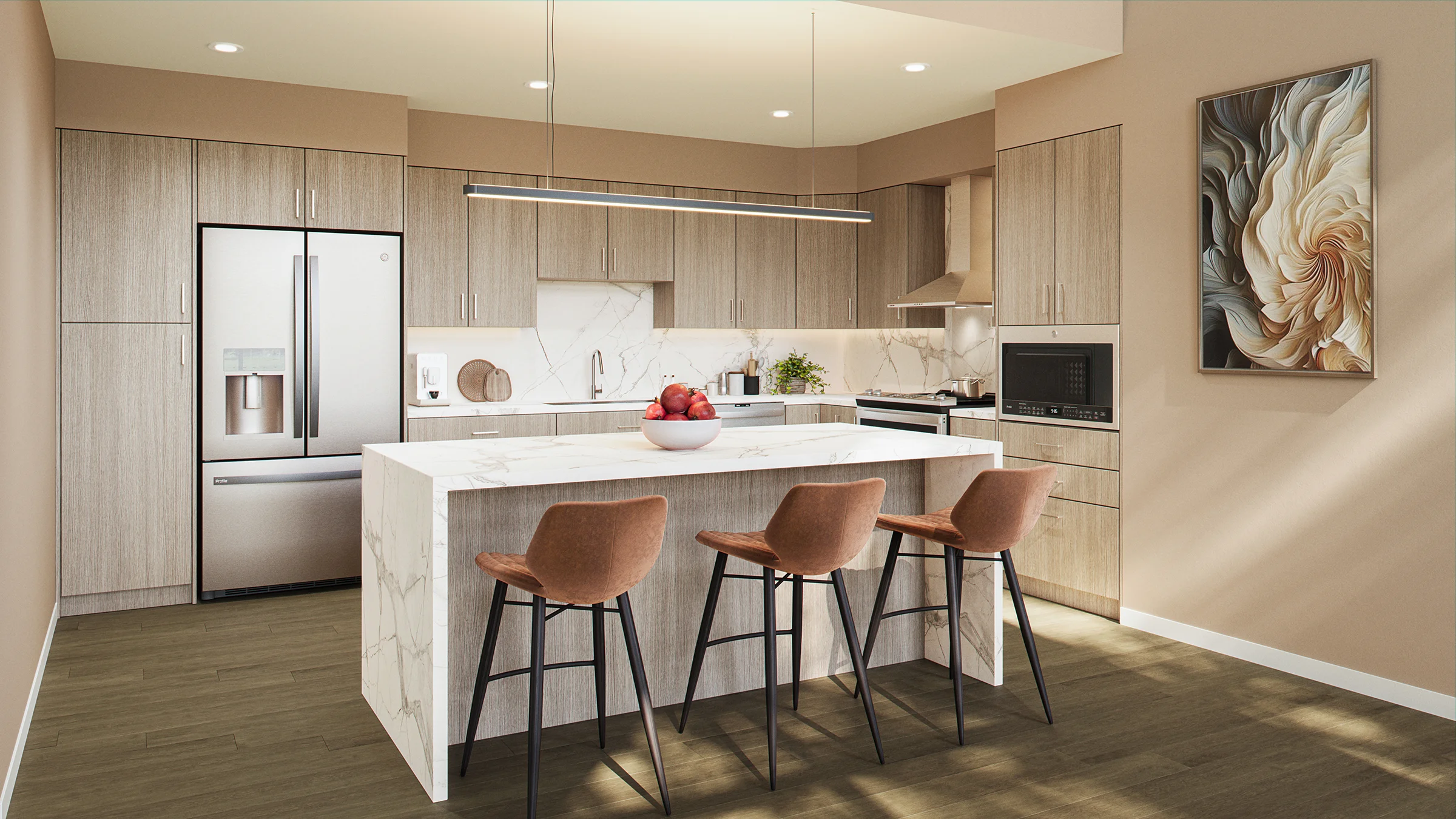 Kitchen interior with white marble island with barstools and cream colored cabinetry.