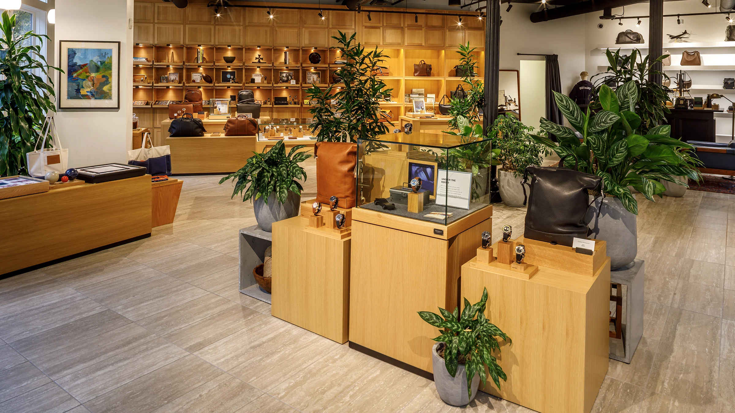 Interior of the Grand Rapids Shinola store. Sleek wood built-ins showcase the watches and leather goods.
