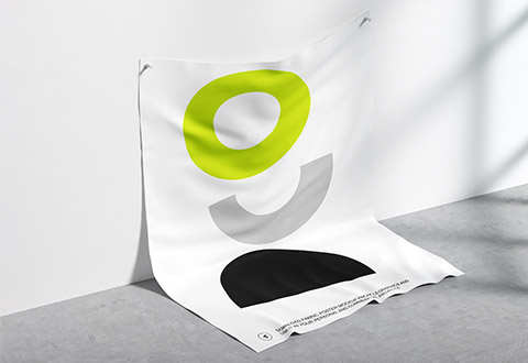 a white bag with a green logo on it