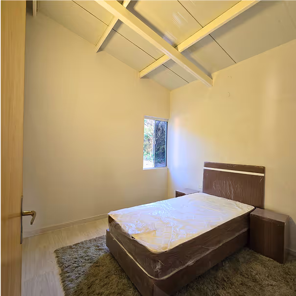 Segundo dormitorio de la CasaMas modelo Minimalista de 2 dormitorios