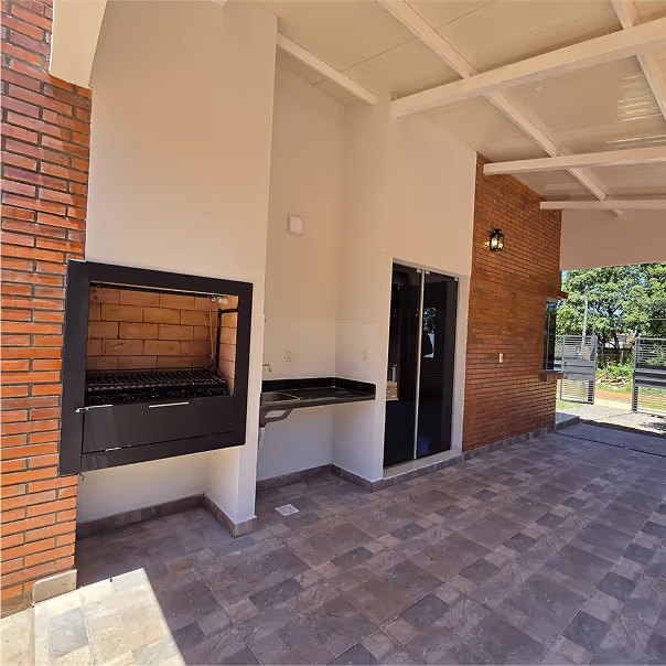 Garage para un auto con parrilla de la CasaMas modelo Clásico de 2 dormitorios