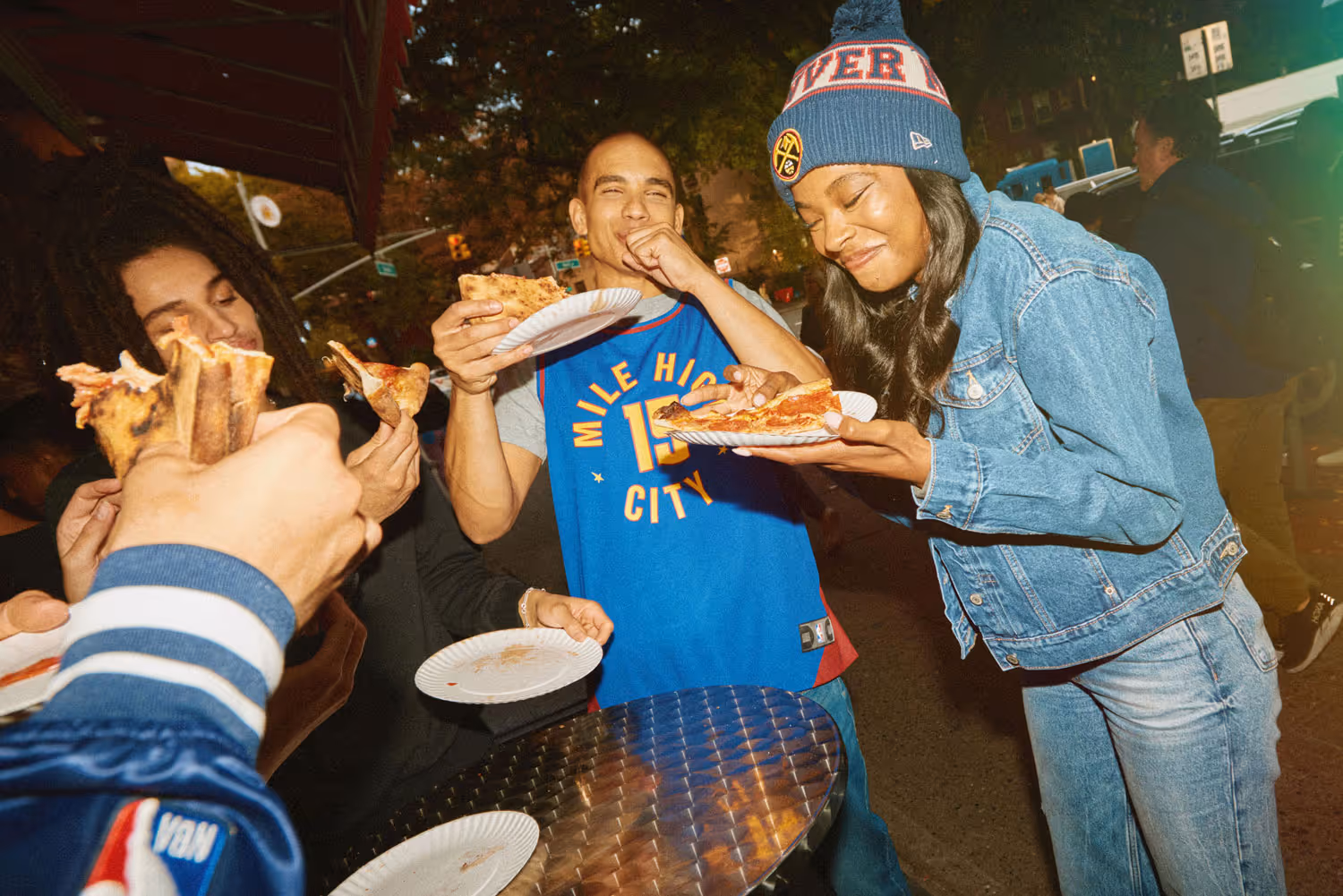 Group of friends enjoying pizza