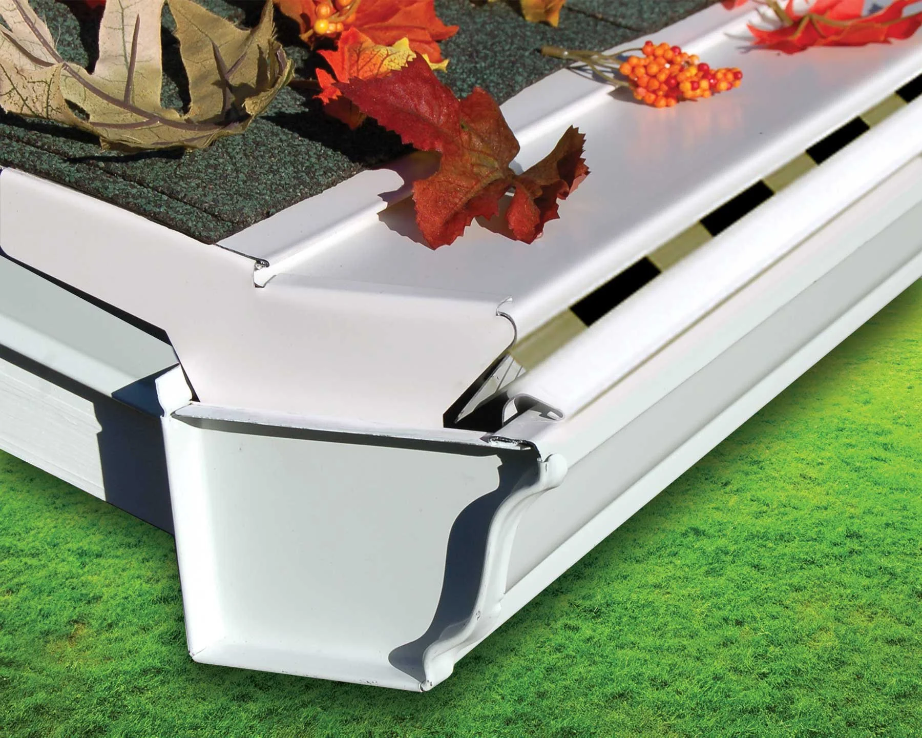 Leafproof brand helmet-style gutter guards - shown effectively keeping leaves out of the gutters
