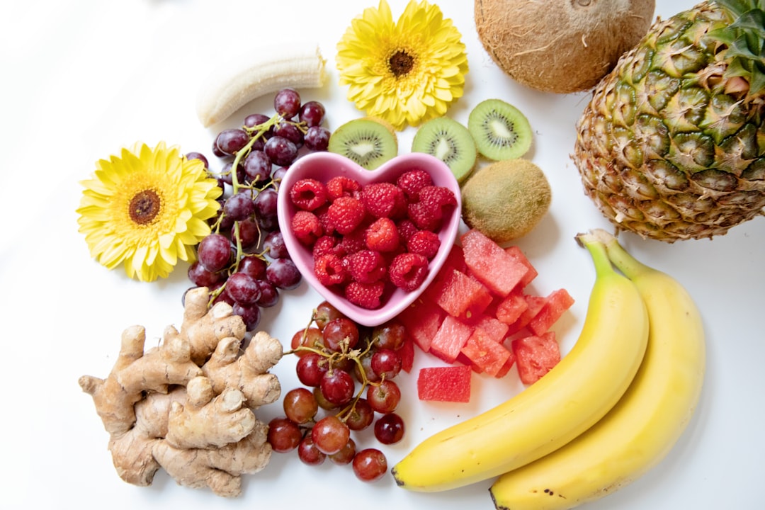 Colorful flatlay of fruits and healthy foods illustrating key brain nutrients like protein, complex carbohydrates, healthy fats, vitamins, and minerals