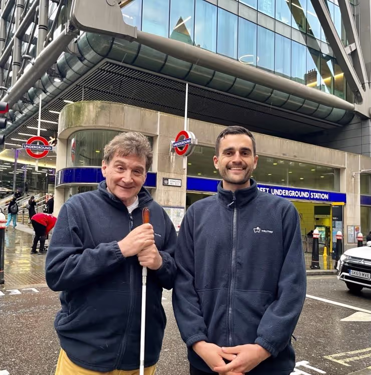 A photo of Tom Pey, CEO of Waymap, and Celso Zuccollo, COO, in front of a London underground station.