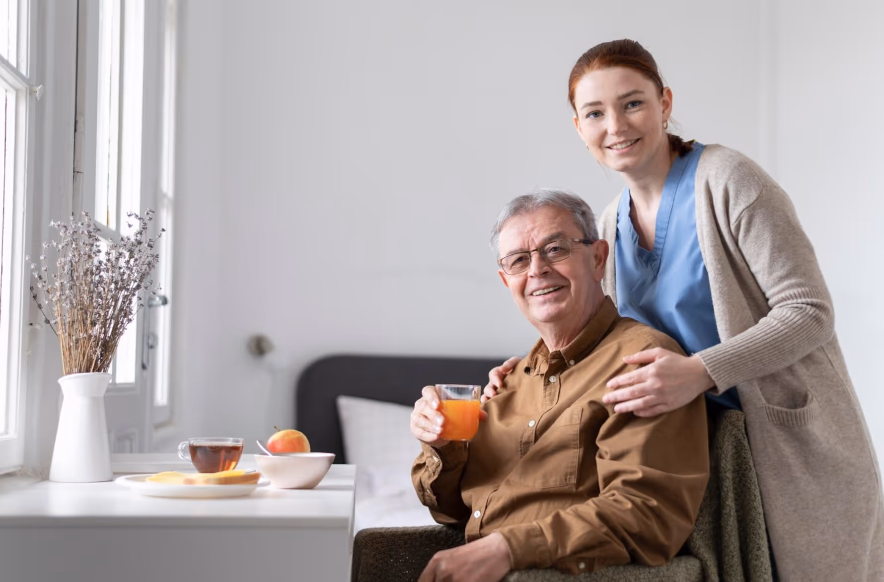 Caregiver overlooking a senior client