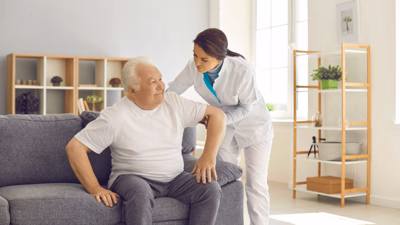 BrightPoine Care - Caregiver helping a senior with his daily living.