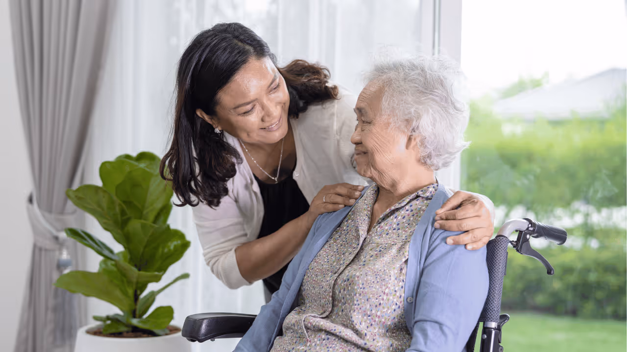 BrightPointe Care - Caregiver helping a senior in their wheelchair. 