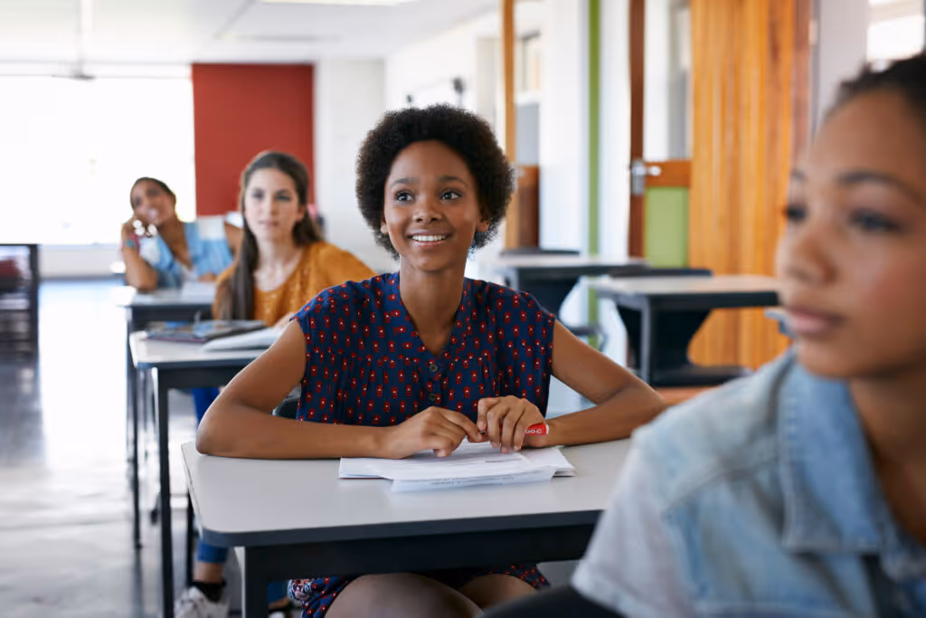 Female student looking up in classroom