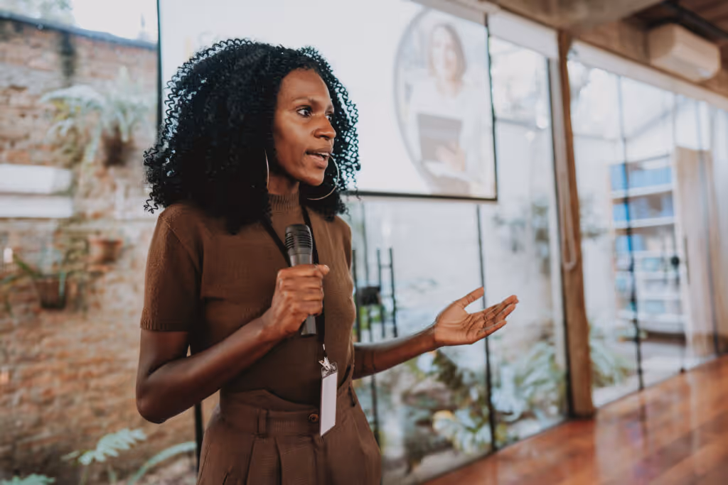 Woman giving branding presentation.