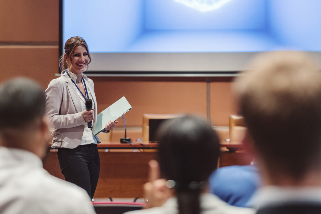 Public speaker at science convention.