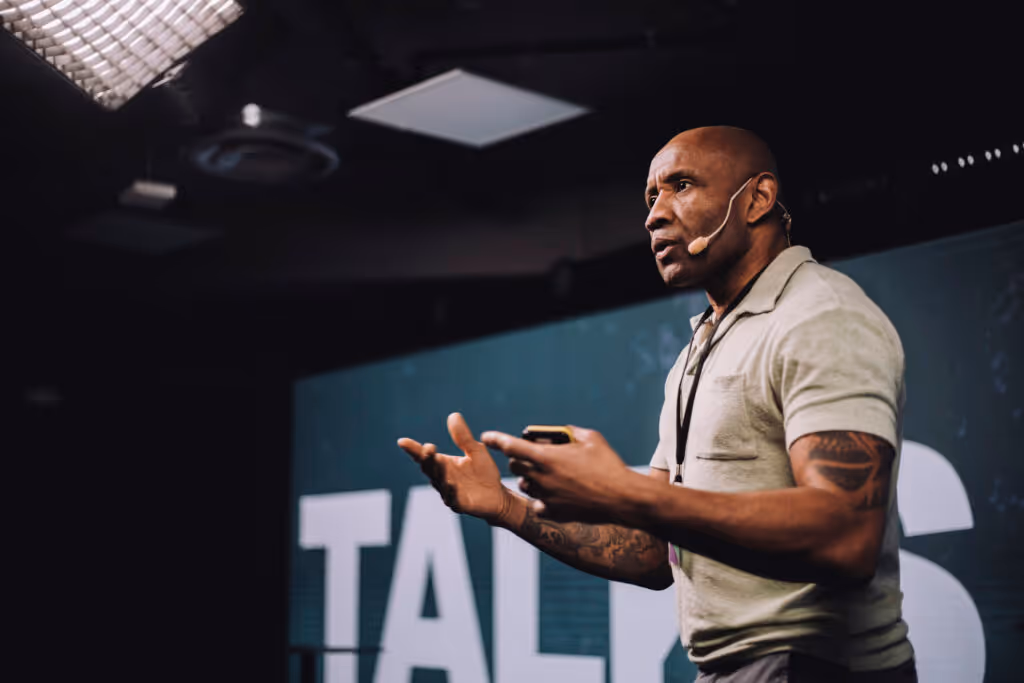 Male public speaker using the storytelling presentation style.