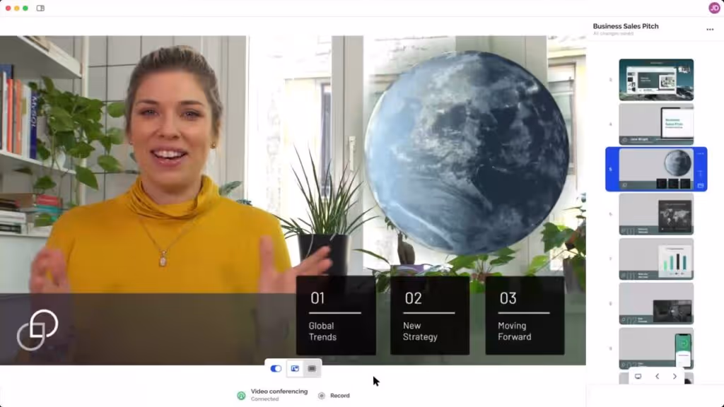 A women is showing off how she can have her content alongside herself with Prezi Video.