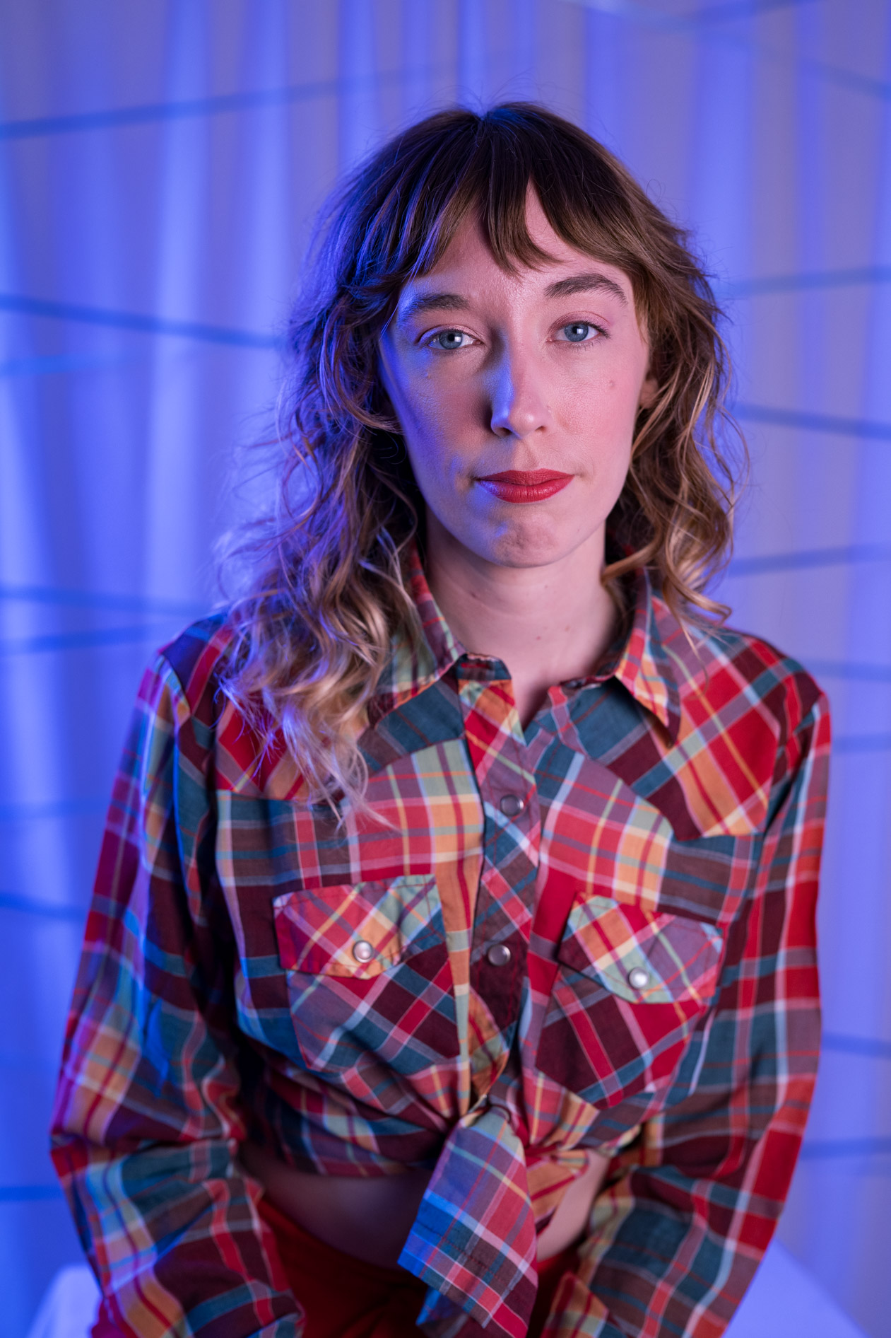 kayla looks plaintively at the camera in our portland studio