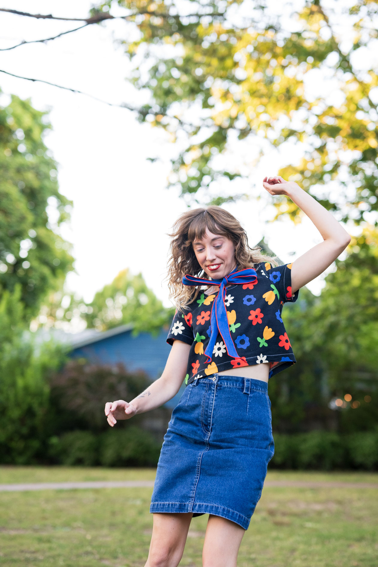kayla leaping for joy in a portland park