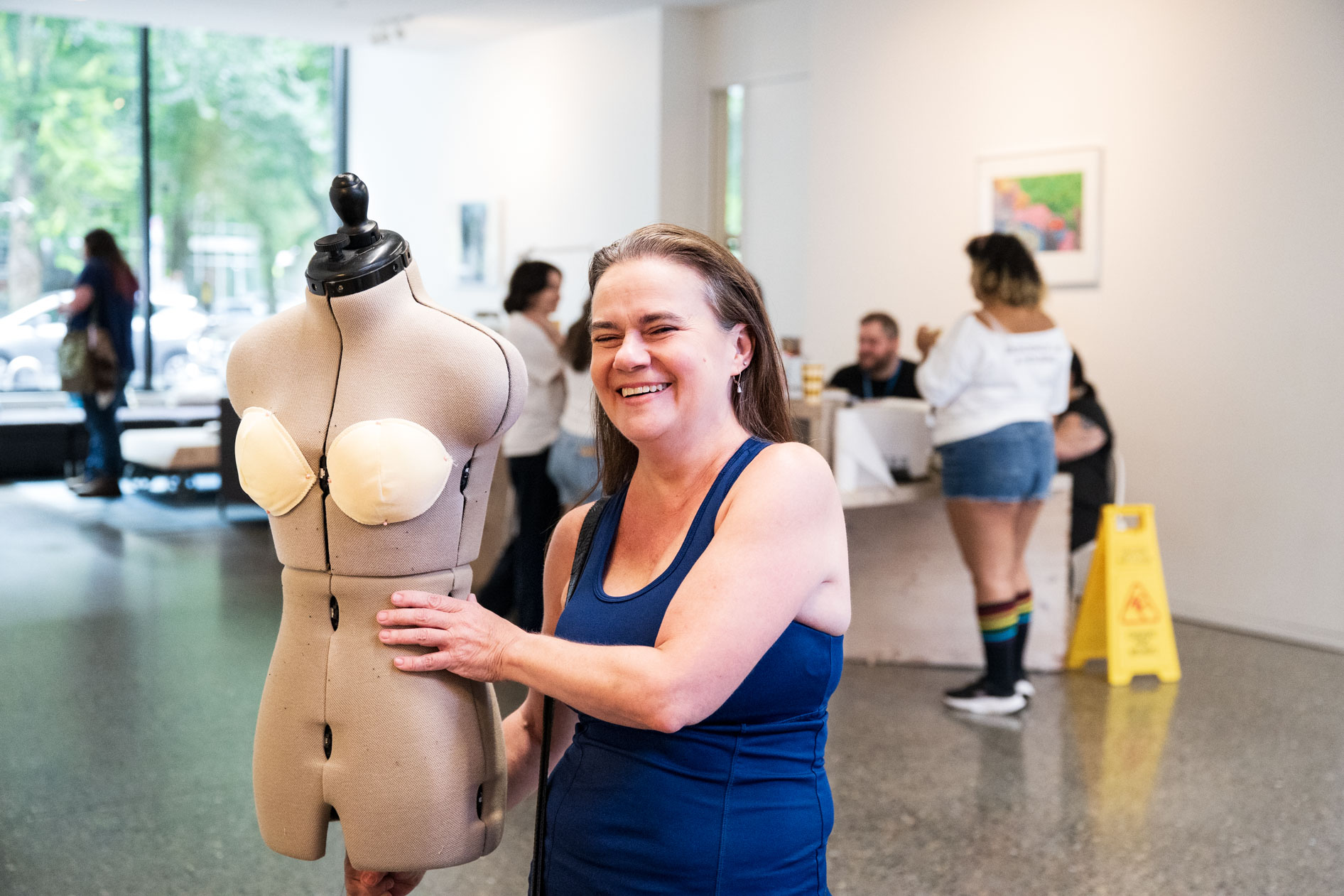 a parent wheels in a mannequin at a dorm in downtown Portland