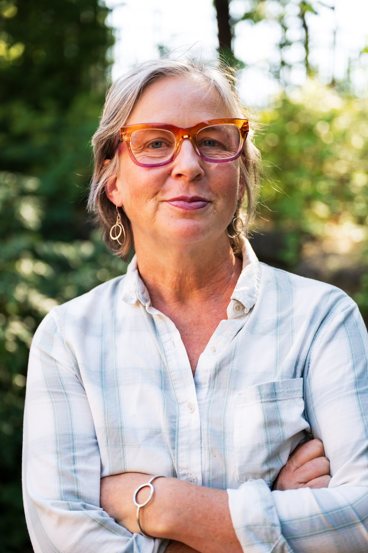 A smiling inclusive headshot of a Northwest Health Foundation leader at the JREP convening event.