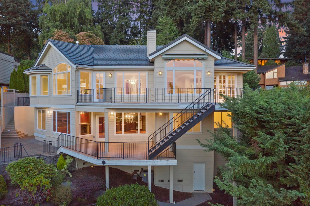 Twilight exterior view of a split-level home remodel in Vancouver WA and Portland OR
