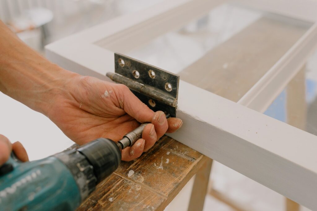 How to flip your first home: replacing doors on a home can raise the value of a property.