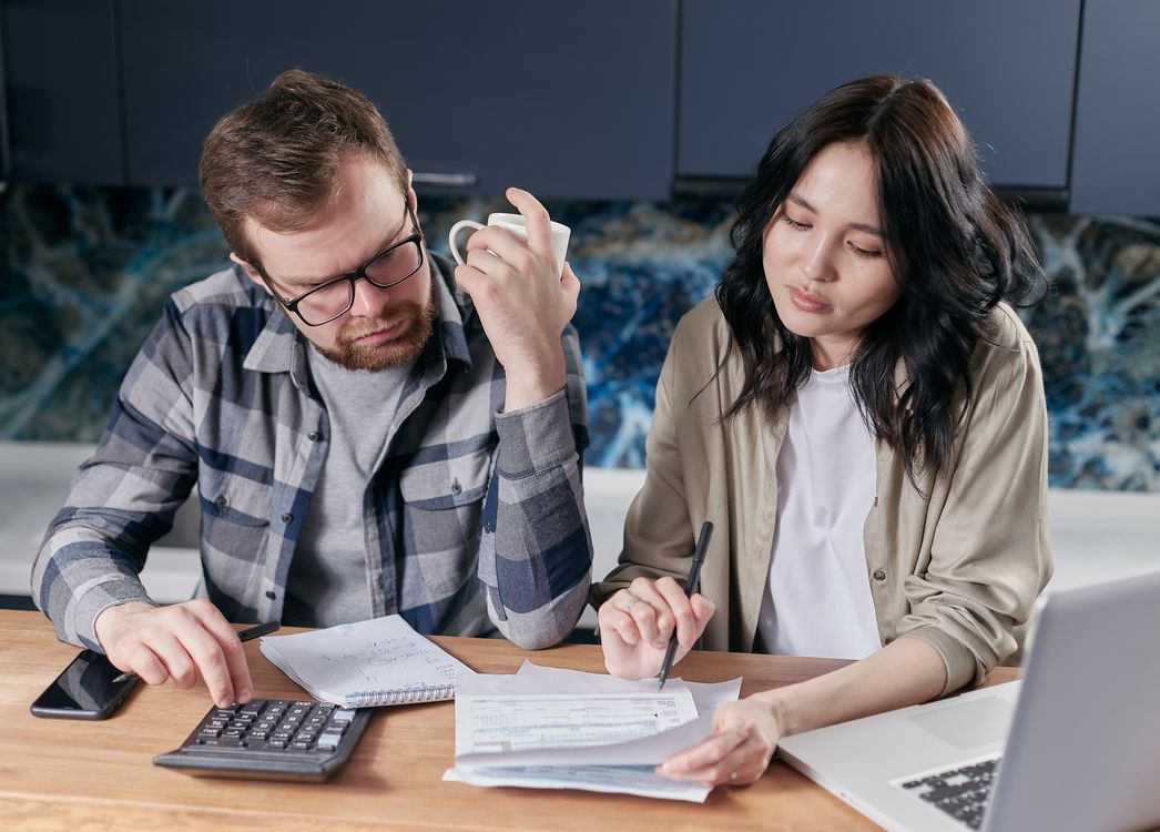 couple reviewing household bills together