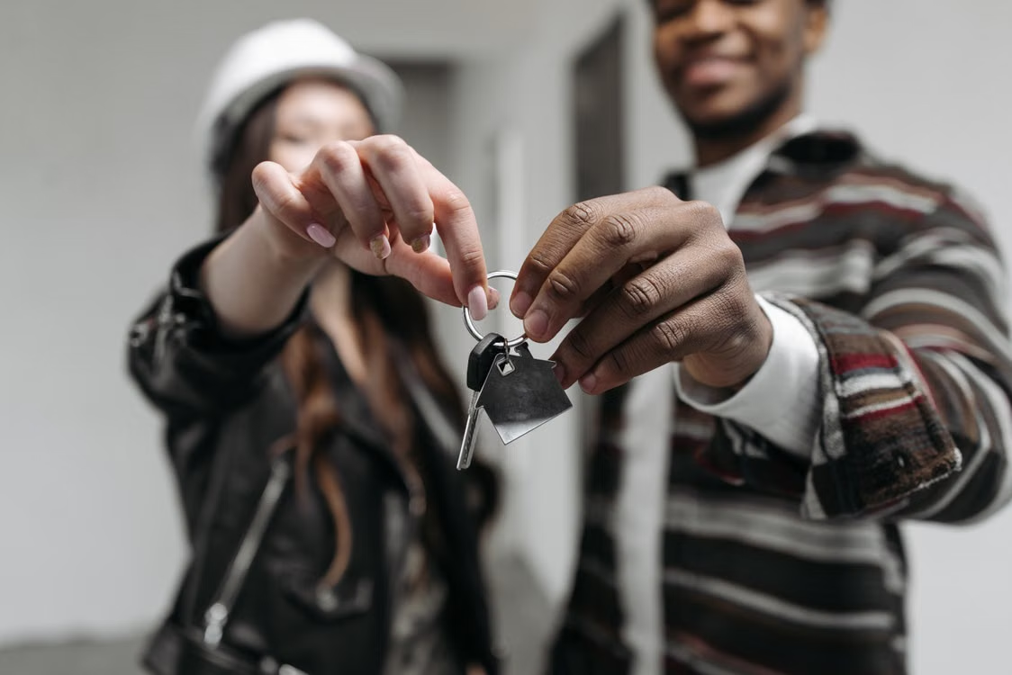 couple holding new house keys