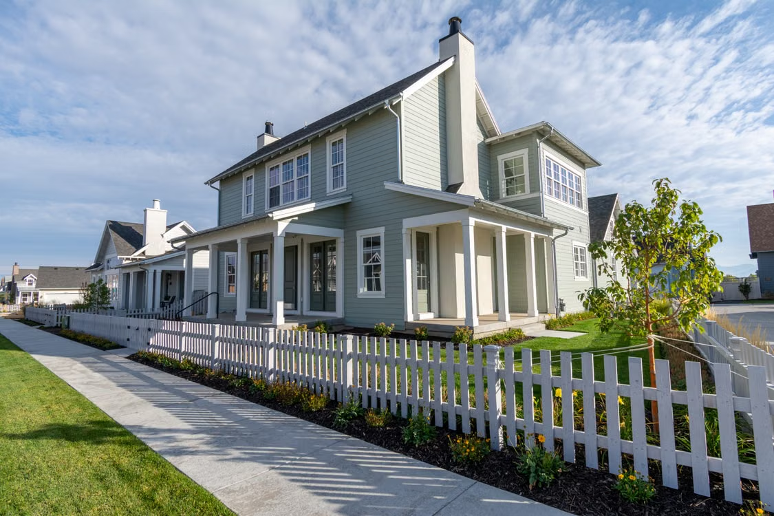 White picket fence suburban home