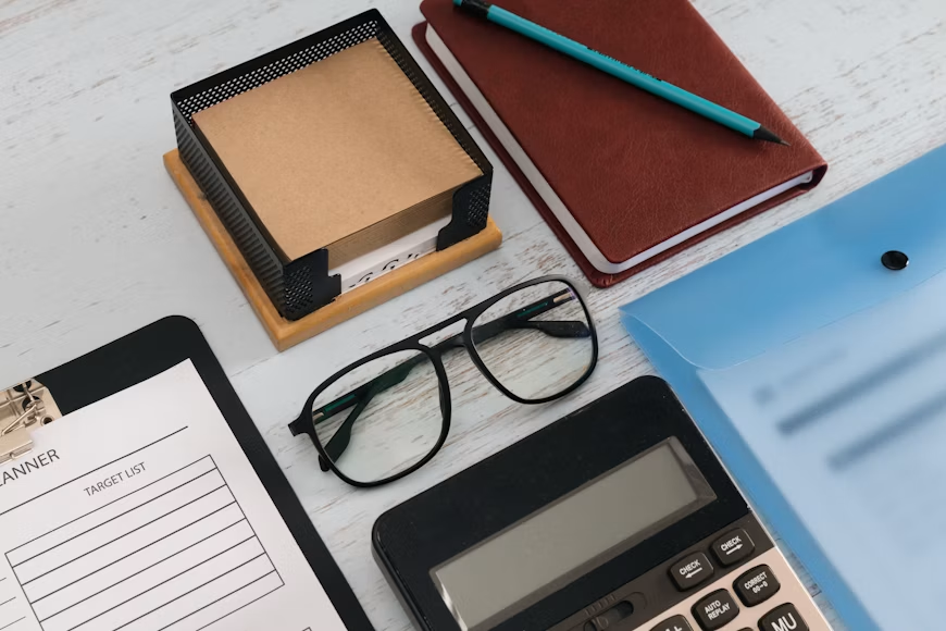 Mortgage paperwork and financial documents on a desk