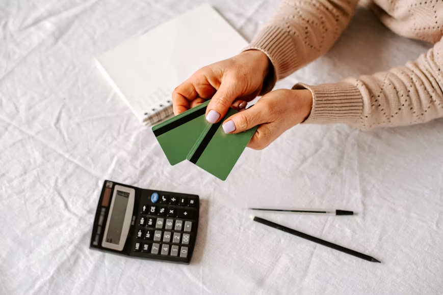 Credit cards and calculator representing personal finances
