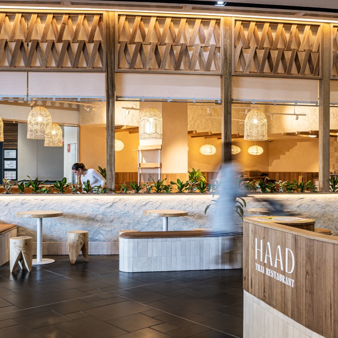 Bride and groom embracing in a lush outdoor setting, capturing romantic storytelling through wedding photography.