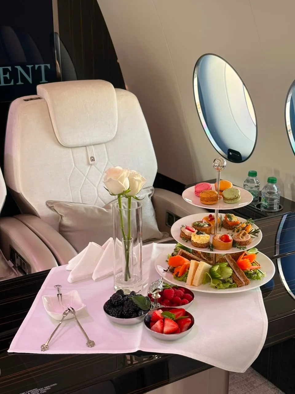 Afternoon tea served in a private jet cabin