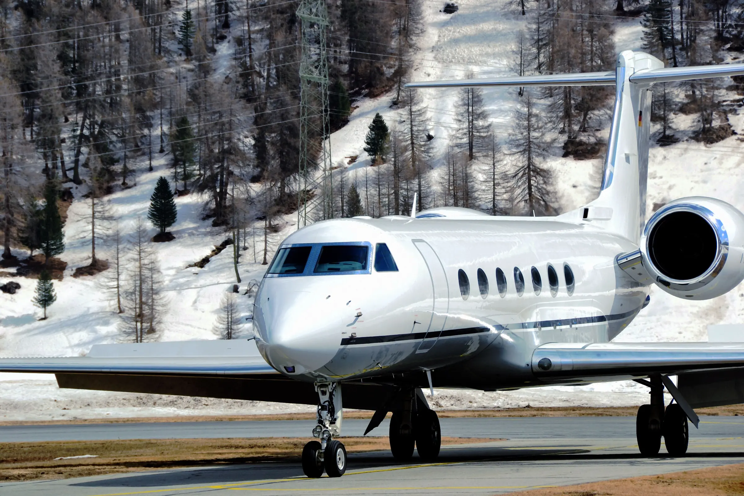 Gulfstream private jet on a snowy Alpine apron