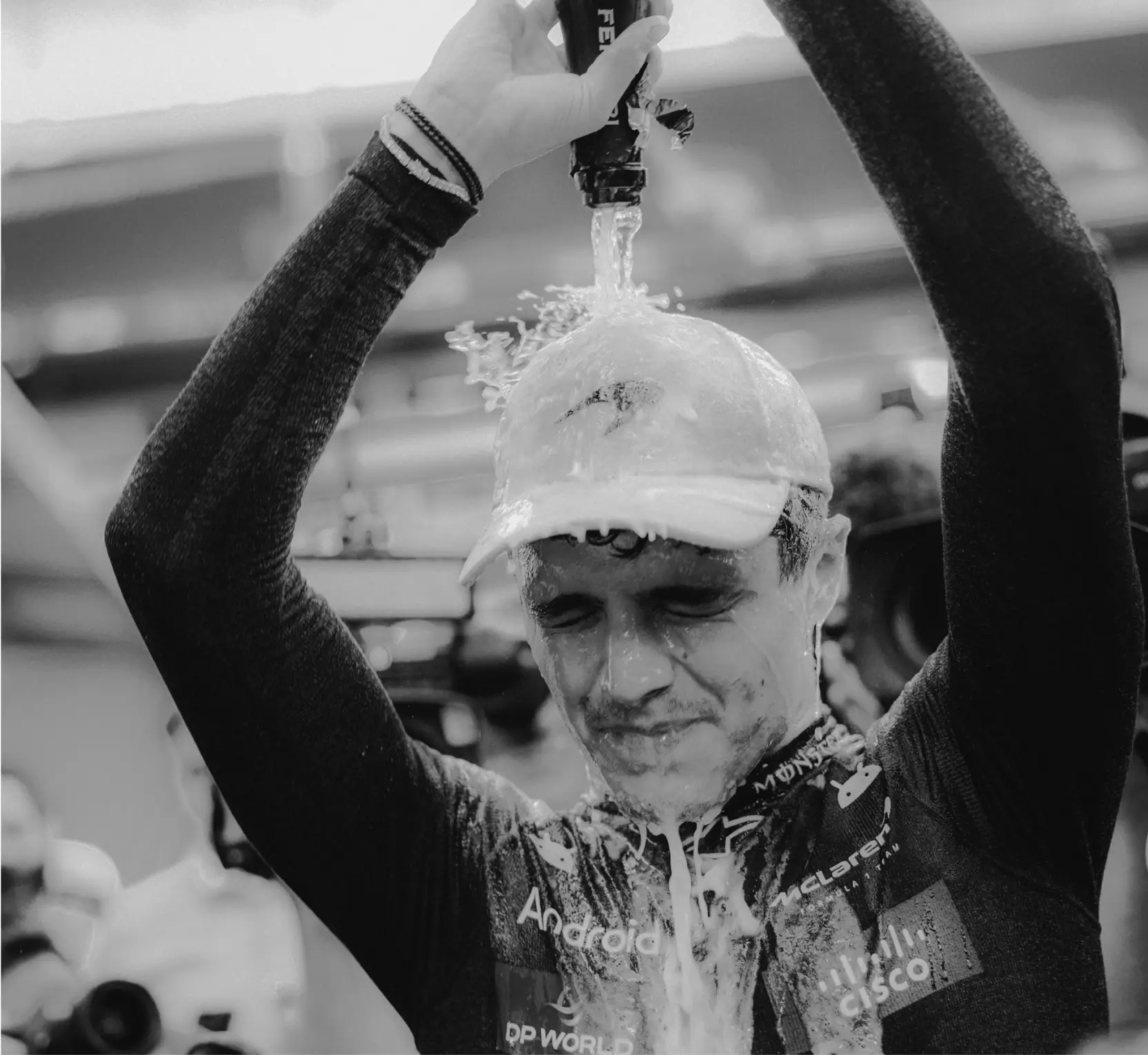 Lando drenching self in champagne