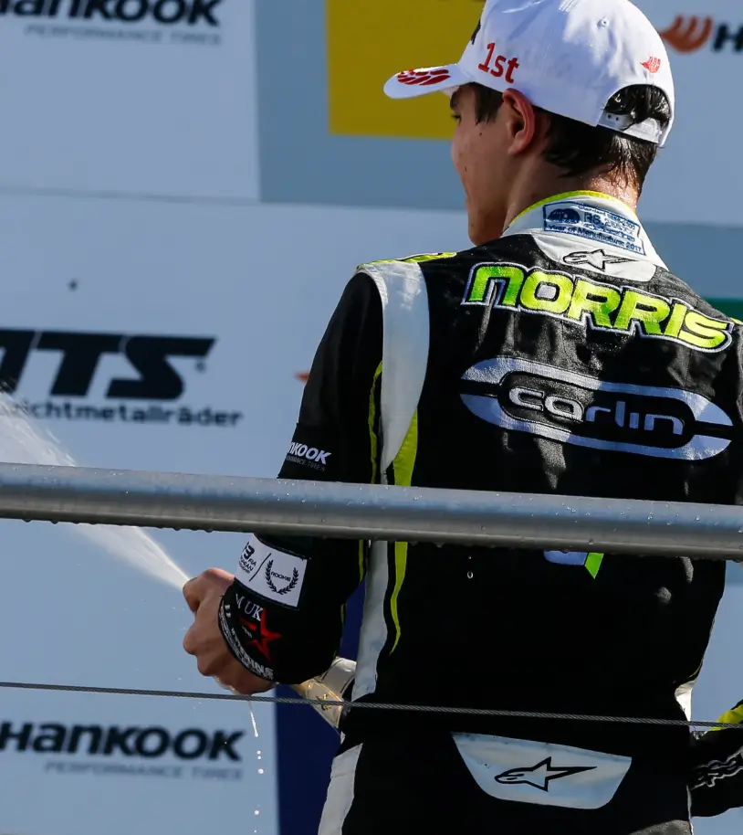 Lando spraying champagne