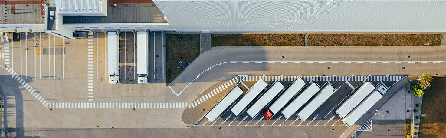Image showing trucks and a factory from overhead