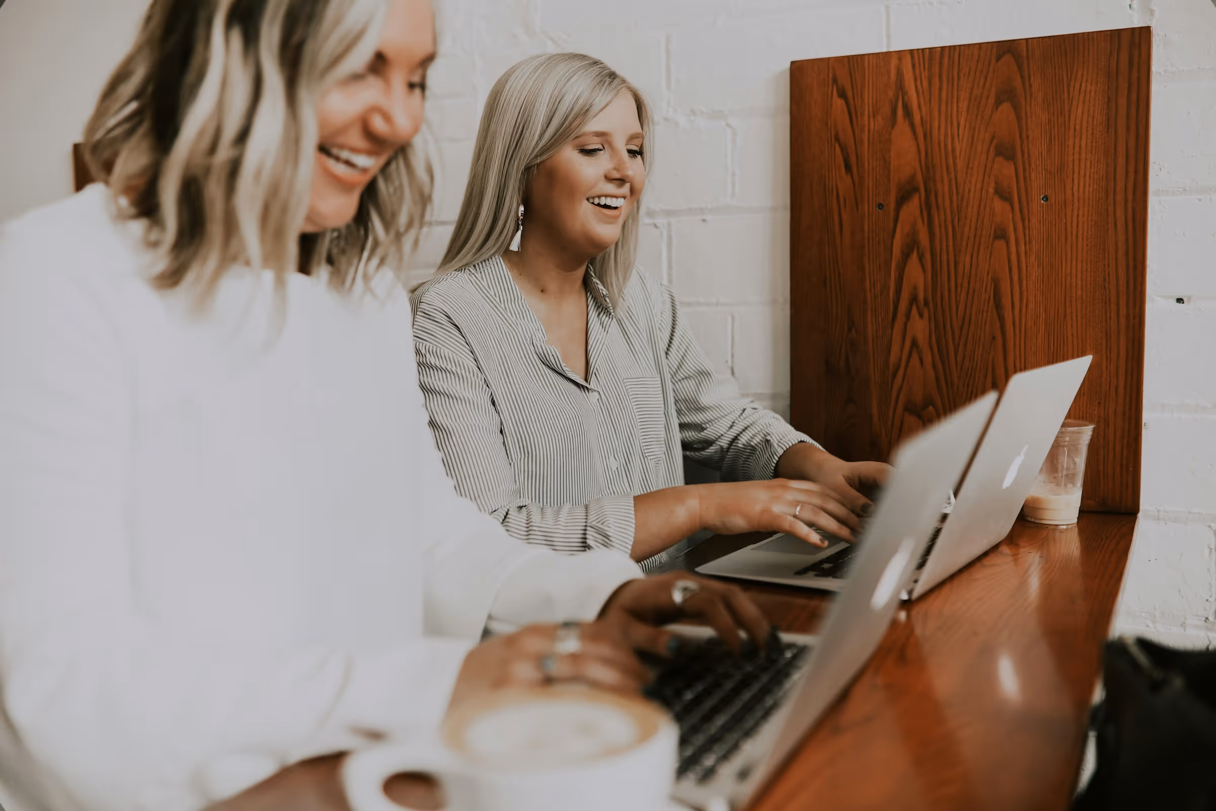 women laughing - Global Payroll Services