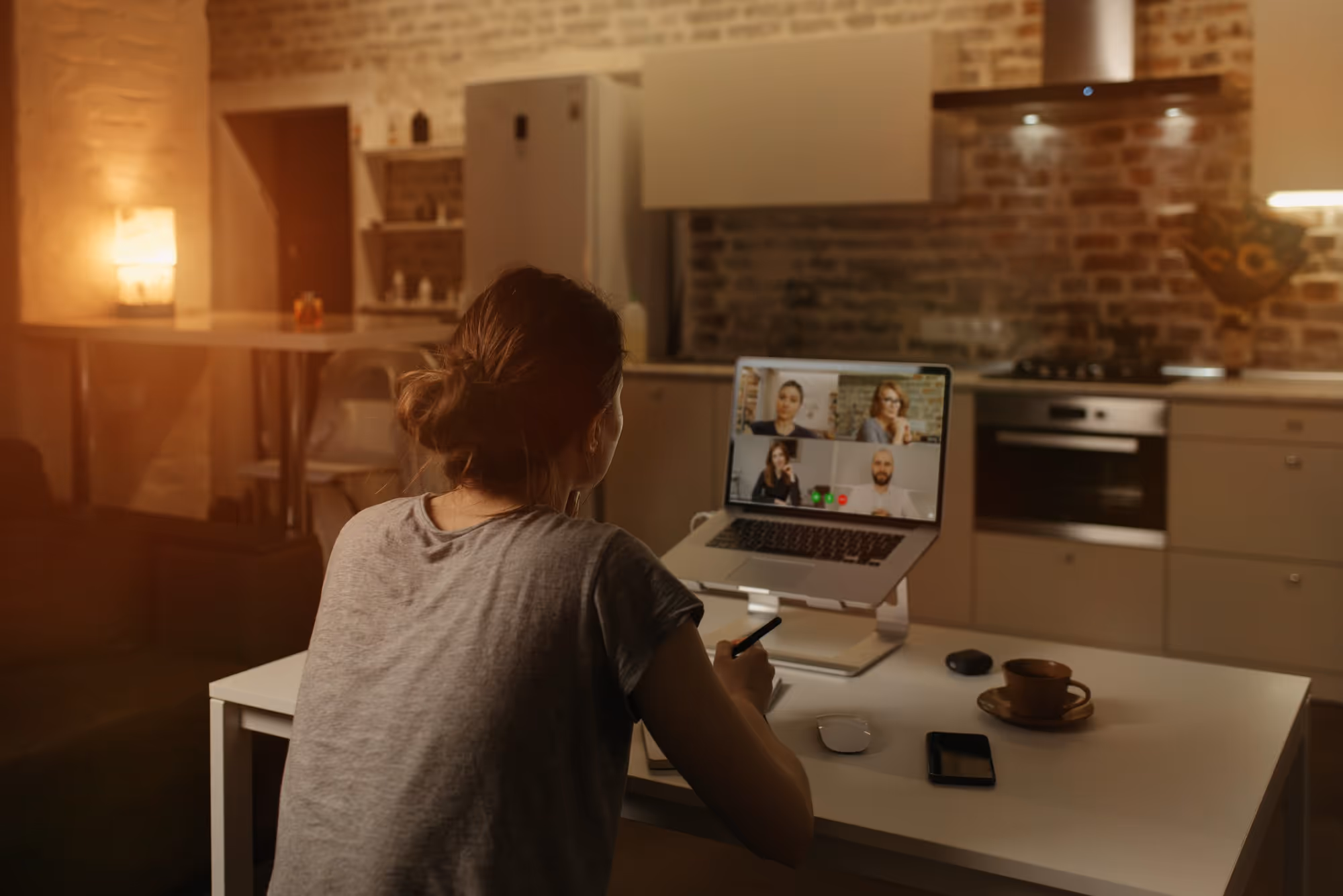 woman on a zoom call - Hiring Remote Employees in Other Countries