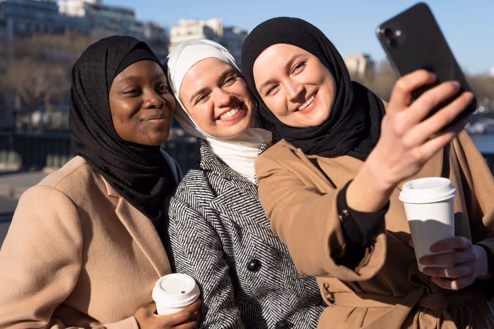 women taking a selfie - National Holidays in Saudi Arabia
