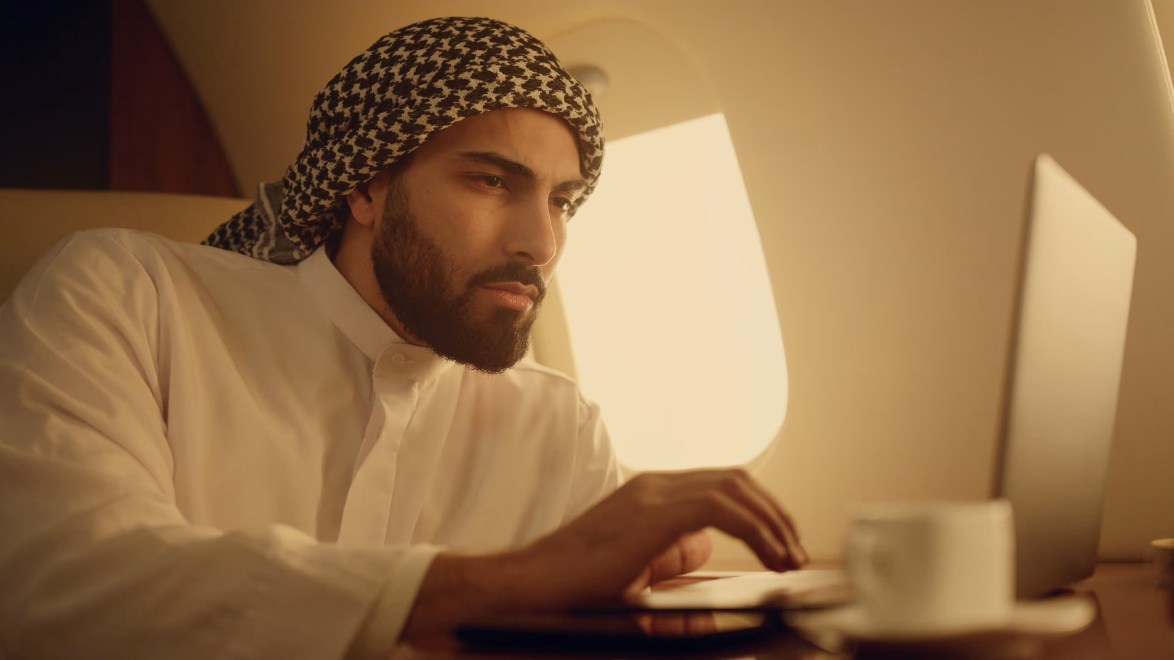man on a laptop - Velocity Global Alternatives