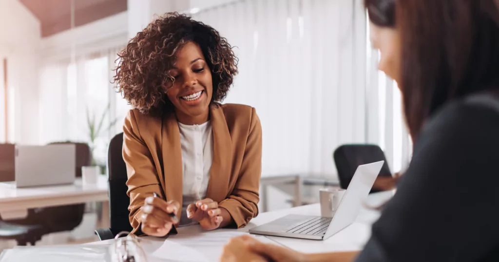 woman smiling - AI Tools for HR 