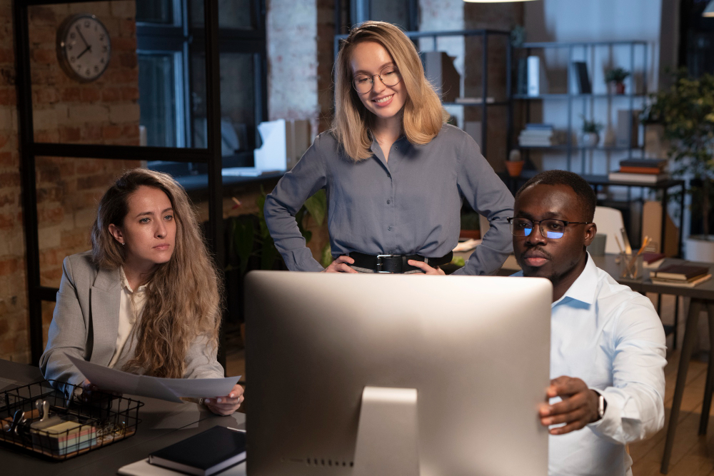 employees in an office - HR Policies in UAE