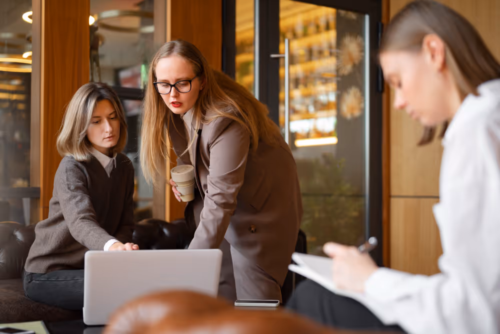 employees in a meeting - Recruitment Agencies in Dubai