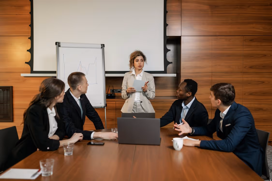 team in a meeting - Remote Team Management
