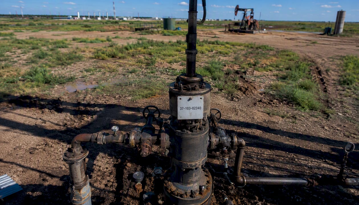 Oil wellhead with visible API number plate