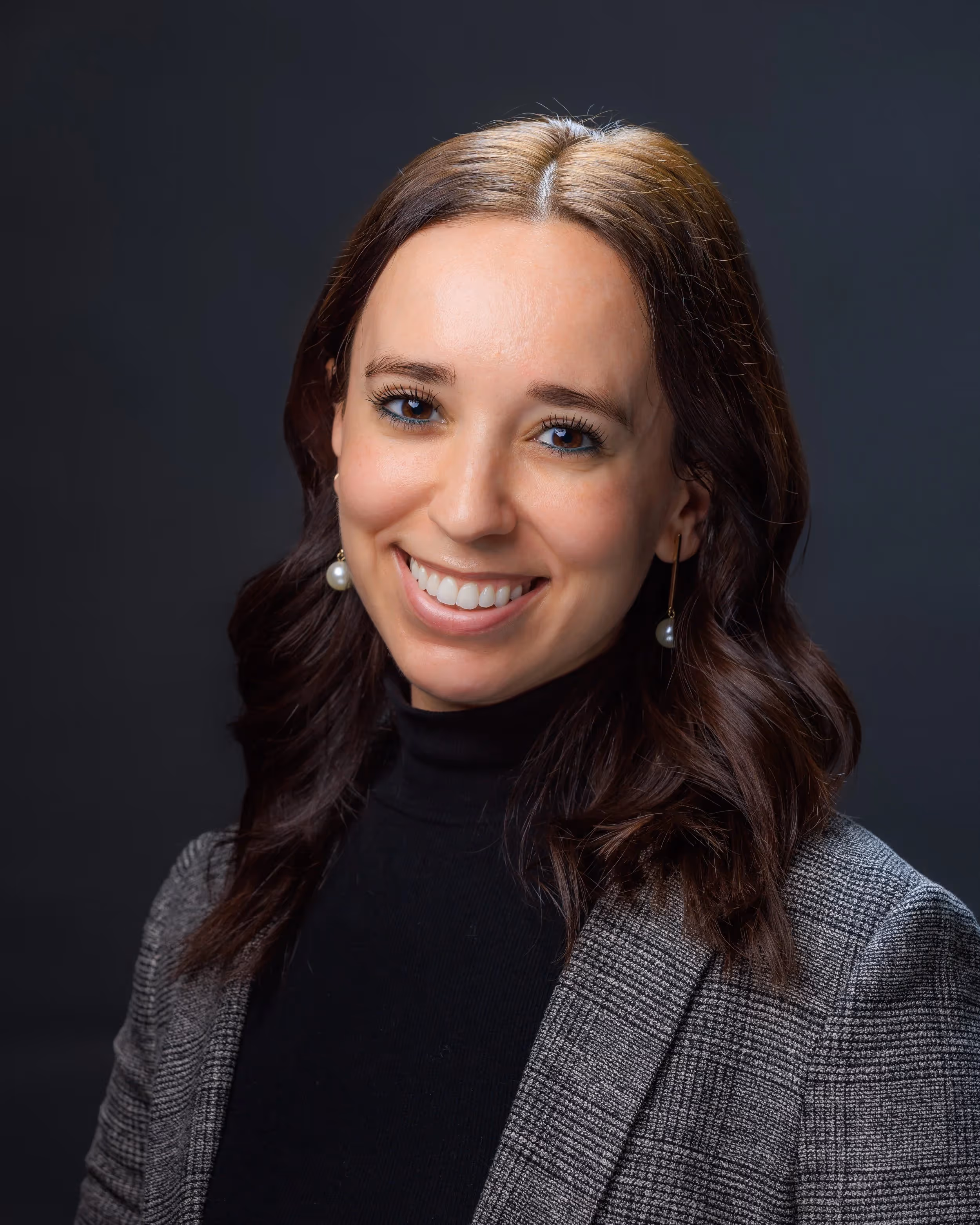 Miriam Berman smiling in professional staff headshot photo