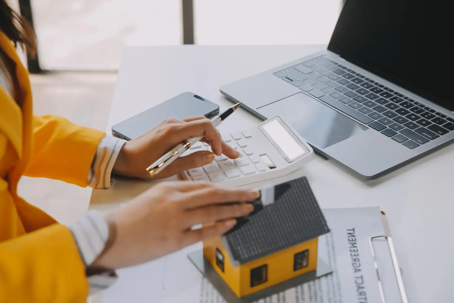 Real estate agent delivering sample homes.