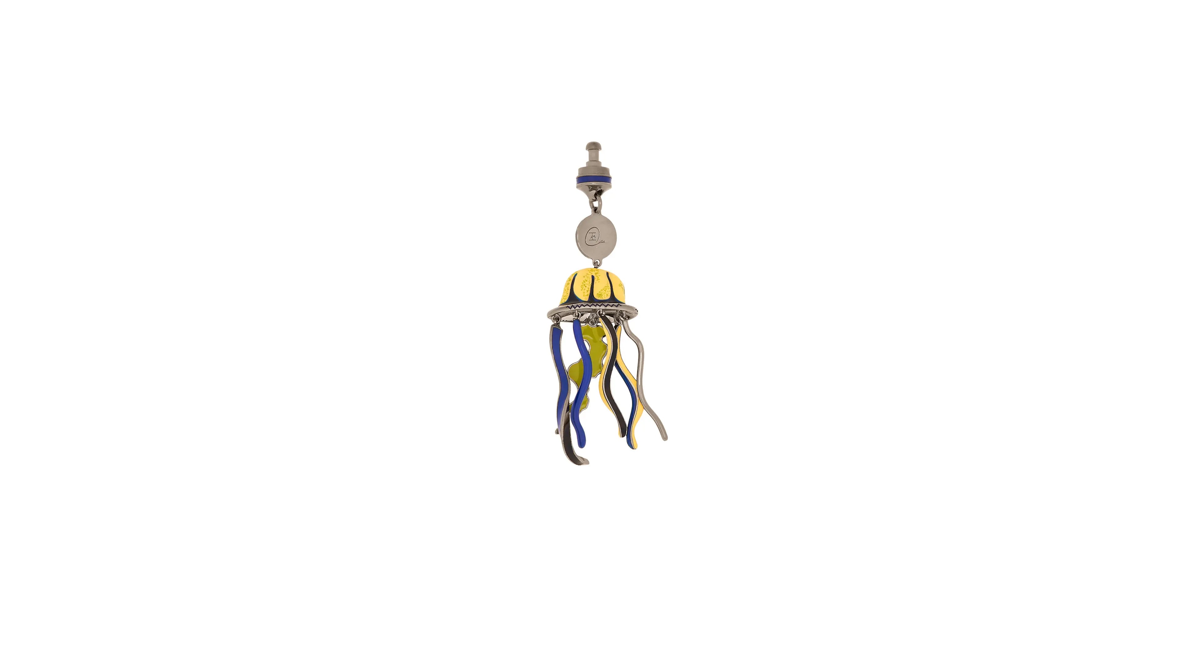 Decorative earring with yellow, blue, and gold elements on a white background
